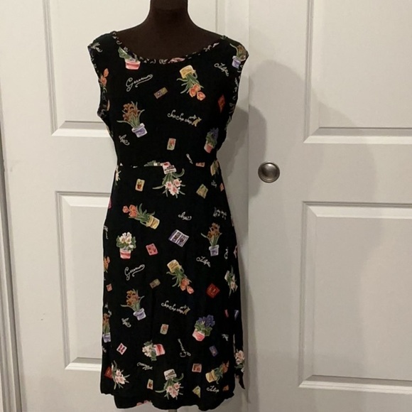 AMARA Dresses & Skirts - Amara Casual Black Garden Novelty Tie in Back Sleeveless Midi Dress Size Medium